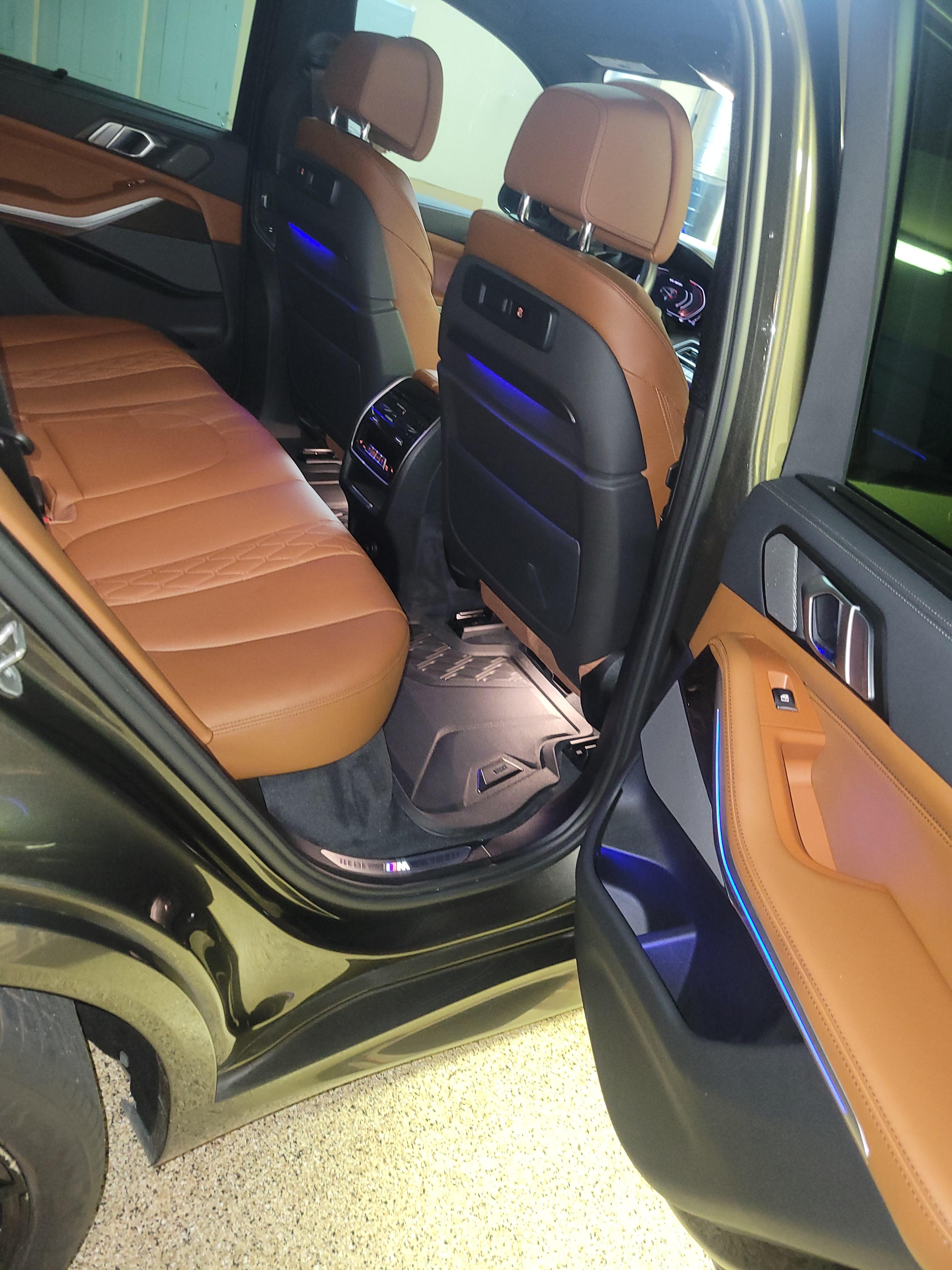 Immaculate brown leather interior of a BMW X5.